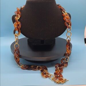 #11. Elegant Gold and Brown Chain Necklace